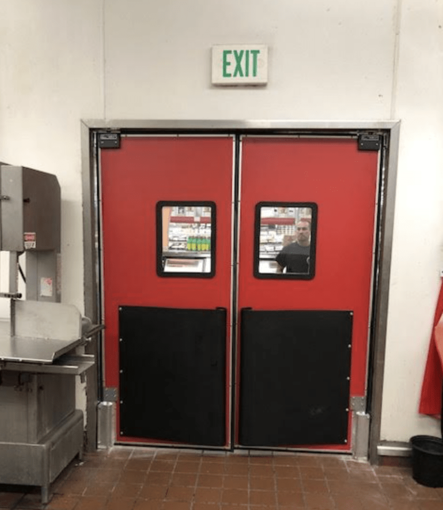 Red double doors, with a "EXIT" sign above
