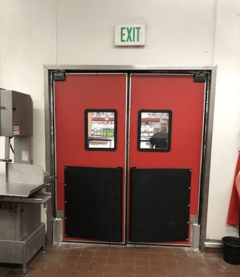 Red double doors, with a "EXIT" sign above